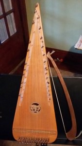 Psaltery and Bow on a Music Stand