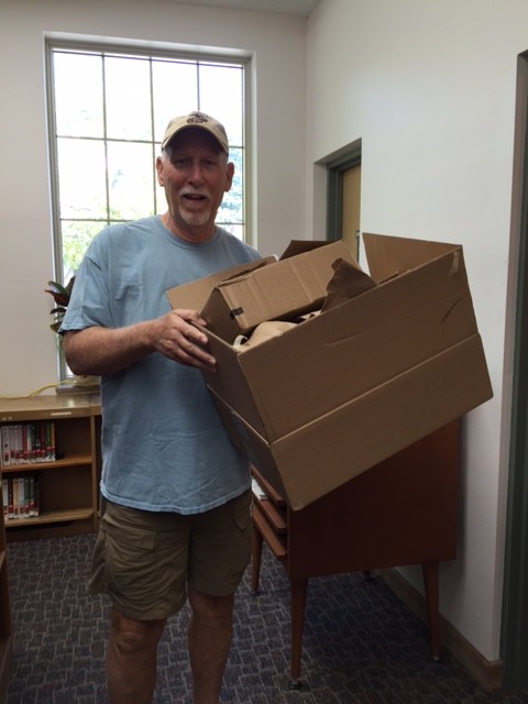 volunteer Carl with box