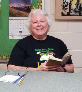 Friend volunteer working the Book Cellar