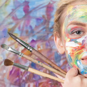 face paint artist with brushes